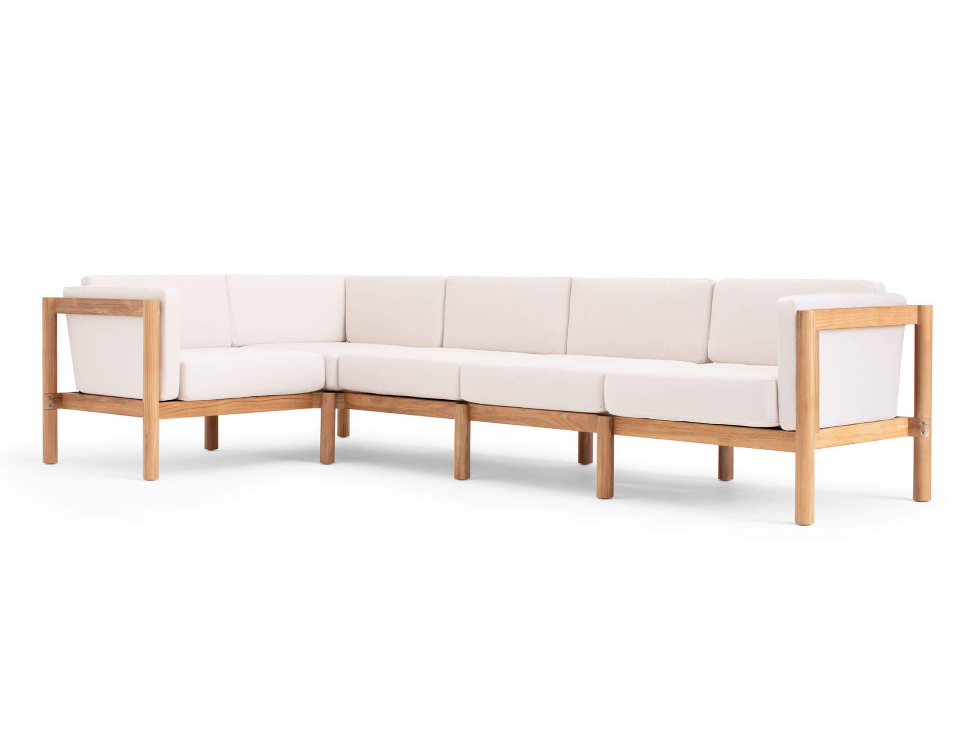 Front angle view of 5-piece outdoor sectional with white arm cushions